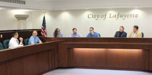 At a meeting both the Lafayette mayor, Tony Roswarski, far right, who supported Chief Flanelly in the creation of the podcast, and the mayor of West Lafayette, John Dennis, second to the far right, can be seen. Patty Payne, pictured toward the center, is the podcast’s director, a regular co-host and producer. (Photo provided by the city of Lafayette, Ind.)